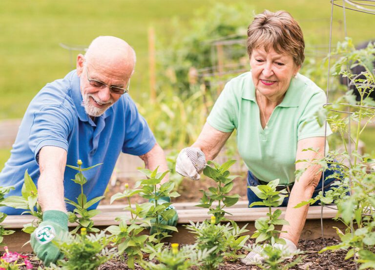 The Heritage of Green Hills | Two seniors gardening together
