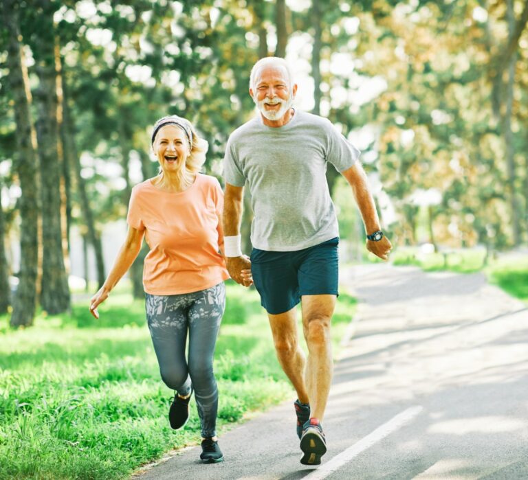 Senior couple running to stay active and healthy